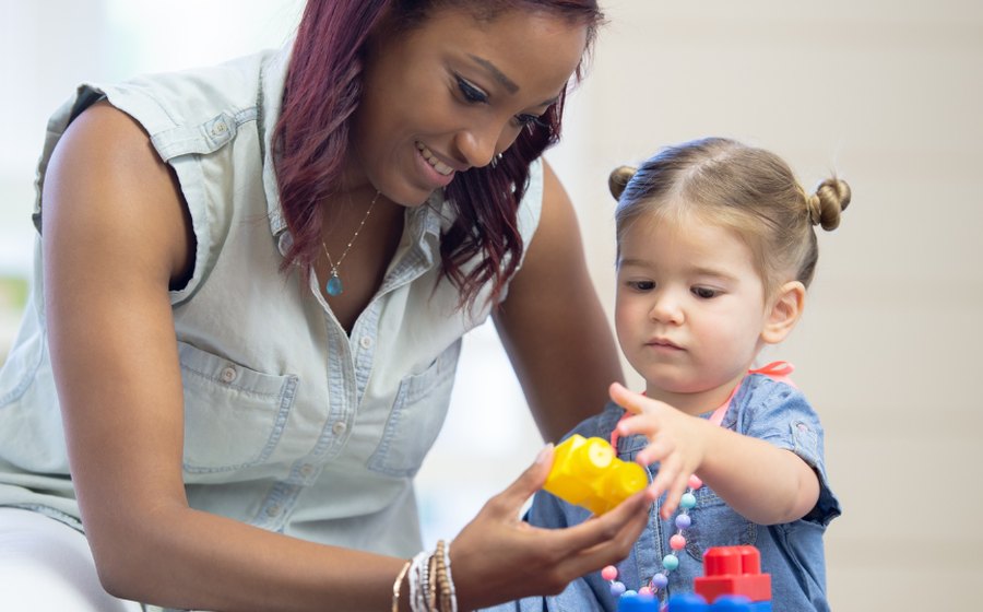 A mother and child enjoying imaginative play together